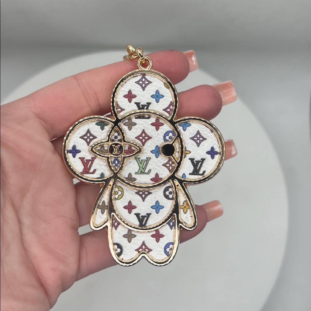 1458. LV Gold and White Multicolor Key Holder 2 3/4”